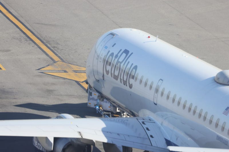 A JetBlue jet moves along the runway at Laguardia AIrport on November 10, 2022 in the Queens borough of New York City. The airline industry has rebounded this year and is looking forward to a busy holiday season.