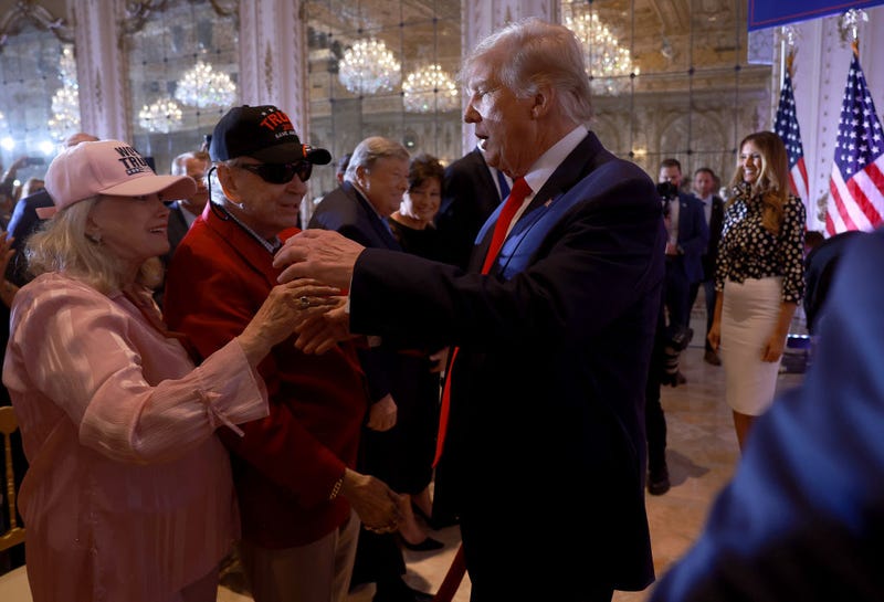 Former U.S. President Donald Trump greets supporters during an event at his Mar-a-Lago home on November 15, 2022 in Palm Beach, Florida. T