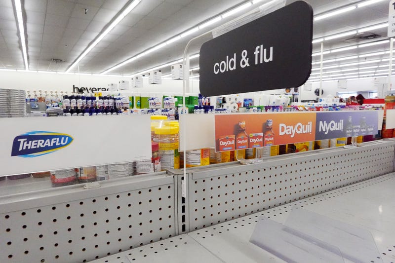 A shelf of cold and flu medicine is empty at a CVS pharmacy on Dec. 6.