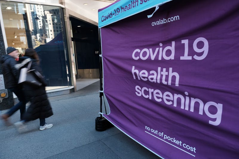 COVID-19 testing site stands on a sidewalk in Midtown Manhattan on December 09, 2022 in New York City.