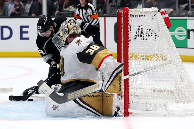 Logan Thompson #36 of the Vegas Golden Knights defends against Viktor Arvidsson #33 of the Los Angeles Kings during the second period of a game at Crypto.com Arena on December 27, 2022
