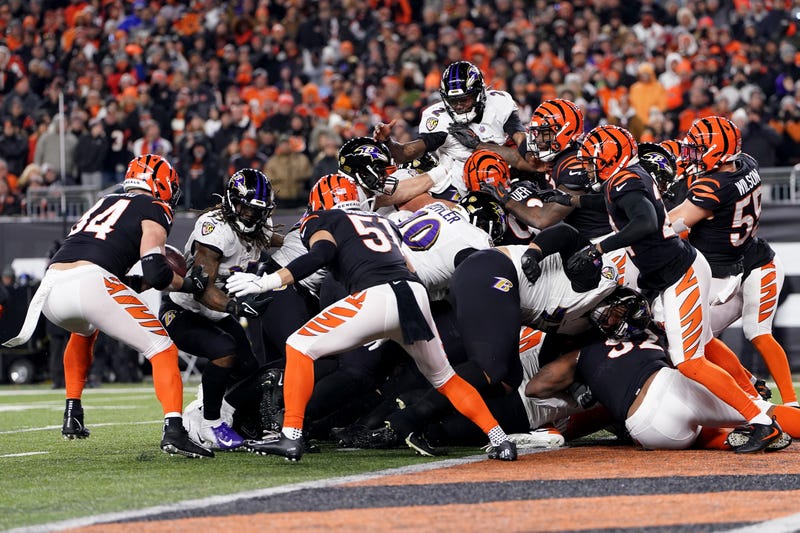 Tyler Hubbard scoops up Tyler Huntley's fumble for an eventual touchdown as the Bengals beat the Ravens, 24-17, in the NFL's Wild Card Round on Sunday (Jan. 15).