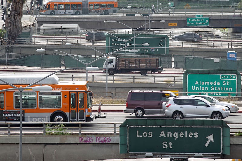 Surface street traffic corsses above the US 101 freeway on April 25, 2013 in Los Angeles, California. The nation's second largest city, Los Angeles, has again been ranked the worst in the nation for ozone pollution and fourth for particulates by the American Lung Association in it's annual air quality report card. Ozone is a component of smog that forms when sunlight reacts with hydrocarbon and nitrous oxide emissions. Particulates pollution includes substances like dust and soot. (Photo by David McNew/Getty Images)