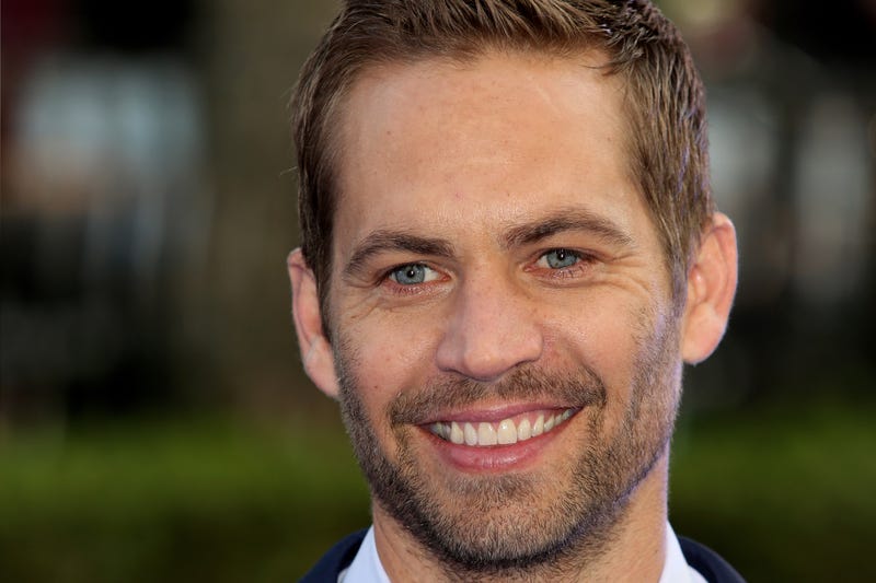 paul walker smiling on red carpet
