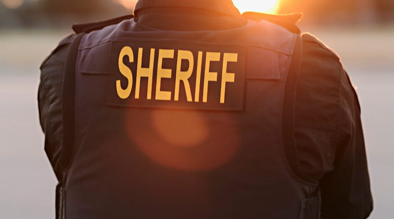 County sheriff police officer.