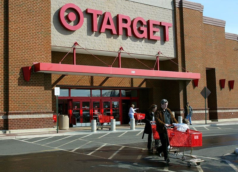Shoppers leave a Target store
