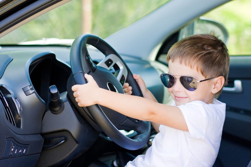 Child behind the wheel