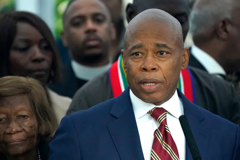 Mayor Eric Adams talks to the press outside Gracie Mansion, the official residence of the mayor of New York City, on September 26, 2024, after he was indicted on federal criminal charges