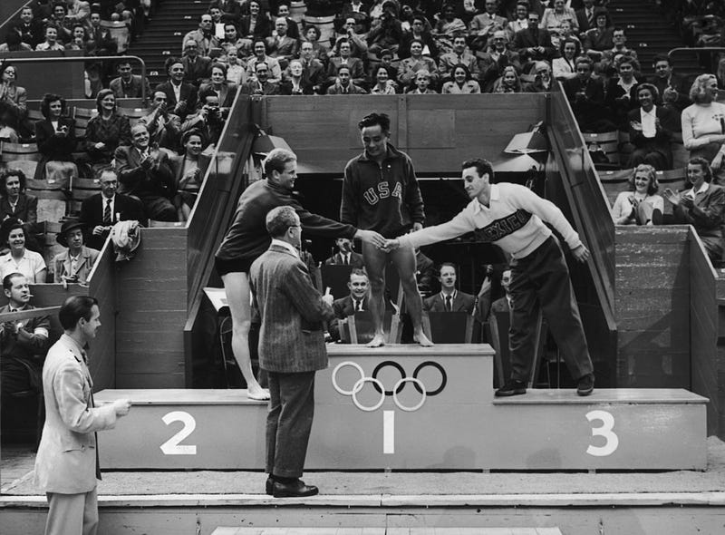 Olympic medal ceremony at the Empire Pool, Wembley. Men's Platform Diving, Bruce Ha