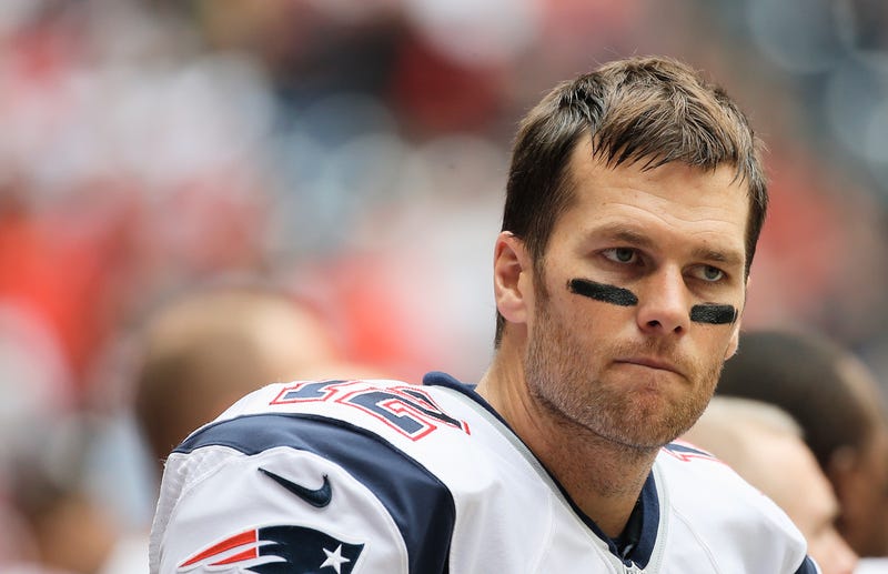 tom brady of the new england patriots looking worried