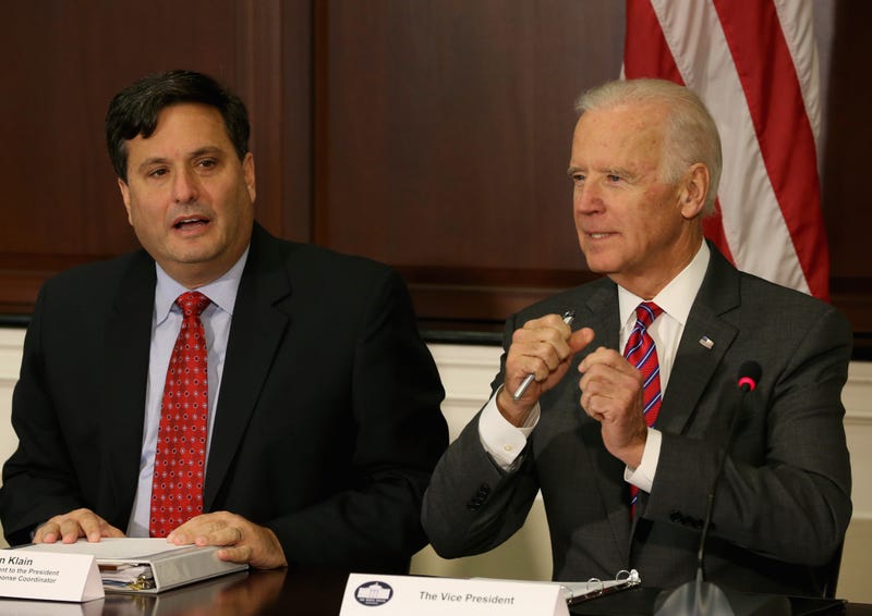 Vice President Joseph Biden (R) and Ebola Response Coordinator Ron Klain (L), participate in a meeting regarding Ebola at the Eisenhower Executive office building November 13, 2014 in Washington, D.C.