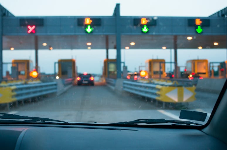 Driving into toll booth