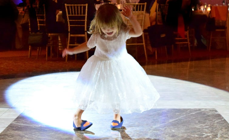 Girl dancing at wedding