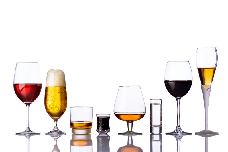 Various types of alcohol in different glasses.