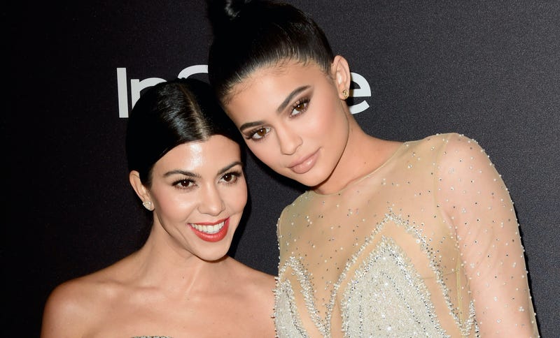 TV personalities Kourtney Kardashian (L) and Kylie Jenner attends InStyle and Warner Bros. 73rd Annual Golden Globe Awards Post-Party