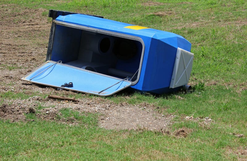 fallen outdoor blue toilet