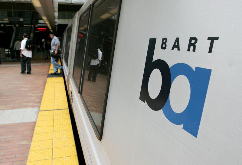 Commuters walk off of a Bay Area Rapid Transit (BART) train July 5, 2005 in San Francisco, California