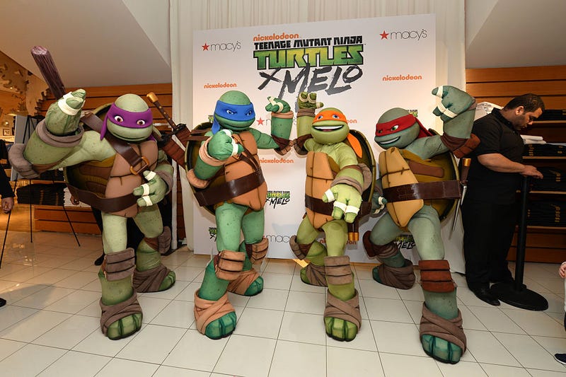 The Teenage Mutant Ninja Turtles pose at Macy's Herald Square for the Launch of TMNT X Melo on May 21, 2016 in New York City.