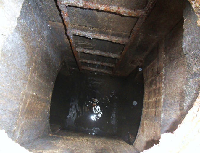 down a sewer manhole