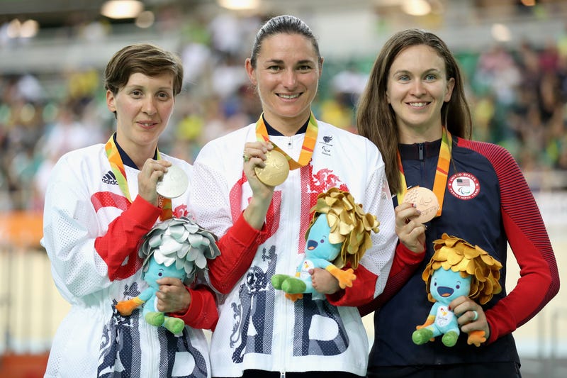 (L to R) Silver medalist Crystal Lane of Great Britain, gold medalist Sarah Storey of Great Britain and bronze medalist Samantha Bosco of the United States celebrate on the podium at the medal ceremony for the women's C5 3000m individual pursuit track cycling on day 1 of the Rio 2016 Paralympic Games at the Olympic Velodrome on September 8, 2016 in Rio de Janeiro, Brazil