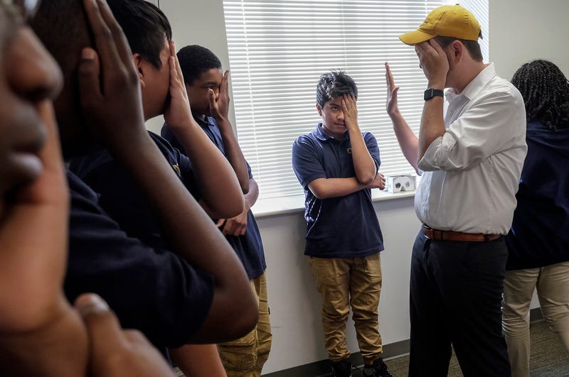 Seth Andrew, right, at a charter school in Washington, DC, on September 8, 2016.