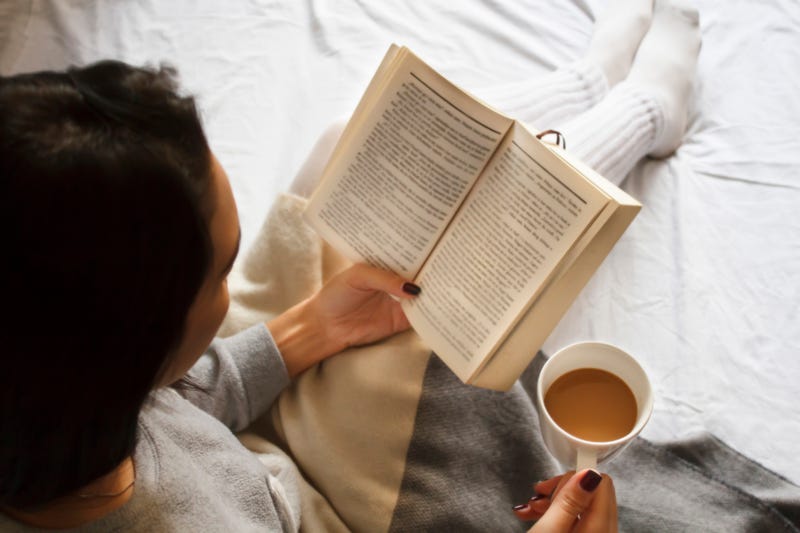 woman reading book