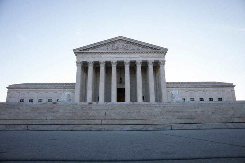 Morning light shines outside The United States Supreme Court building