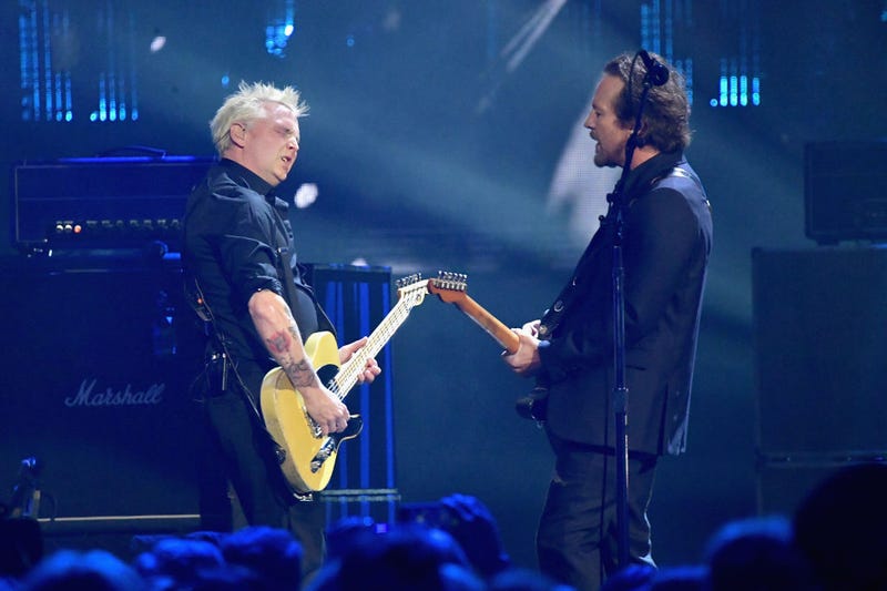 Inductees Mike McCready (L) and Eddie Vedder of Pearl Jam perform onstage at the 32nd Annual Rock & Roll Hall Of Fame Induction Ceremony at Barclays Center on April 7, 2017 in New York City