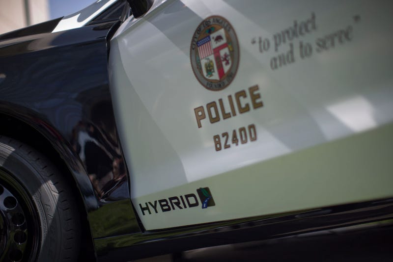 FILE - A hybrid police car is seen at the unveiling of two new Ford Fusion hybrid pursuit-rated Police Responder cars at Los Angeles Police Department headquarters on April 10, 2017 in Los Angeles.