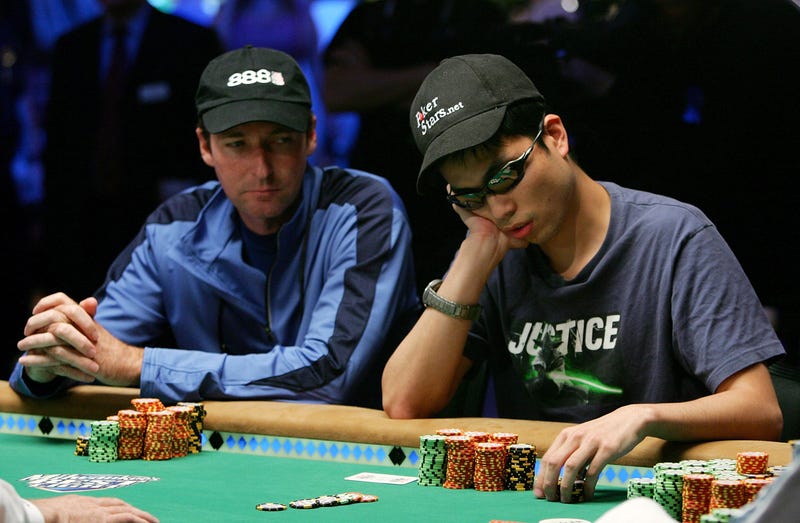 Rhett Butler (L) of Maryland watches Doug Kim of New York place a bet during the World Series of Poker no-limit Texas Hold 'em main event at the Rio Hotel & Casino August 8, 2006 in Las Vegas, Nevada.