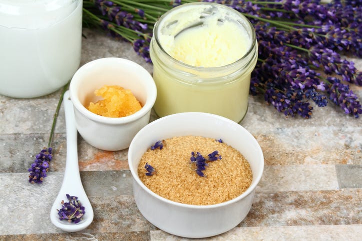 body scrub made from granulated sugar, coconut oil and lavender flowers