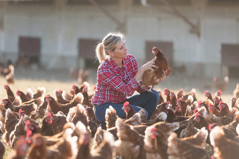 Lady with chickens