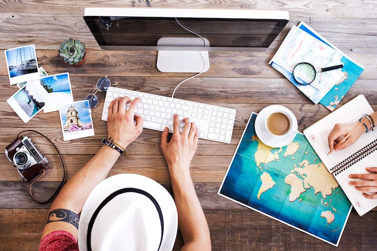 Couple planning tropical vacation