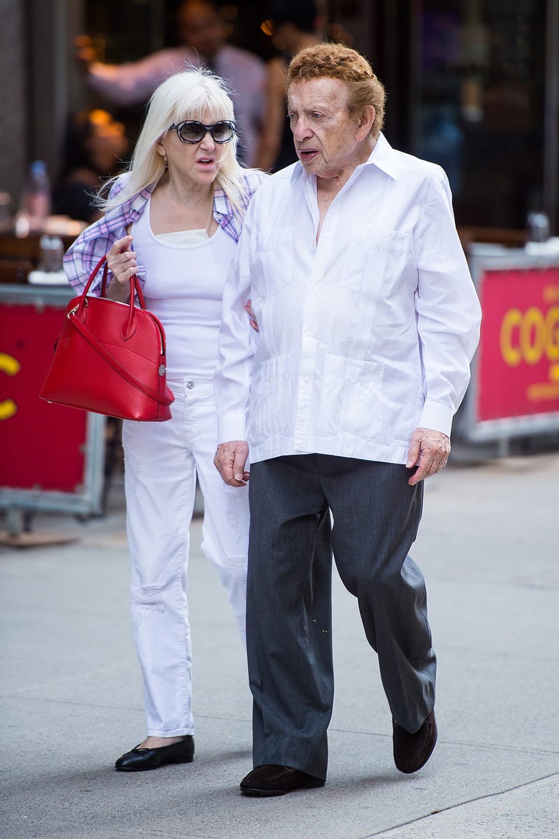 Jyll Rosenfeld (L) and comedian Jackie Mason are seen in Midtown on August 17, 2017 in New York City.