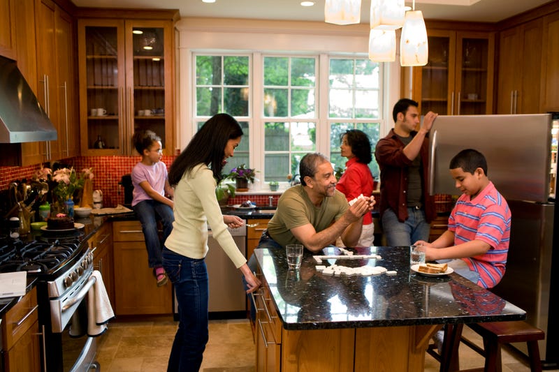 Family gathered in kitchen
