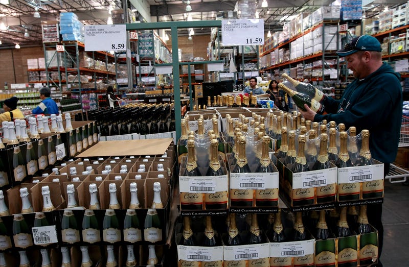 customer shops for champagne at costco