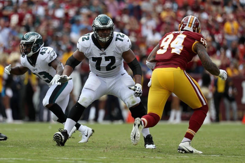 Halapoulivaati Vaitai holds his ground against Redskins linebacker Preston Smith