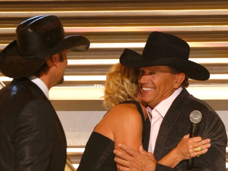 Performers Tim McGraw (L) and Faith Hill and honoree George Strait appear onstage during the 44th annual Academy Of Country Music Awards' Artist of the Decade in 2009