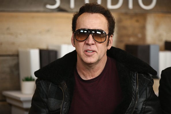 Nicolas Cage looks hip with his shades.