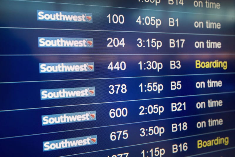 Southwest Airlines flights are listed on a departure board at Midway Airport on January 25, 2018 in Chicago, Illinois.