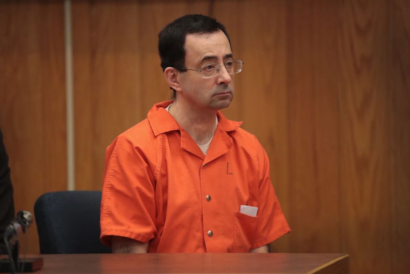 Larry Nassar sits in court listening to statements before being sentenced