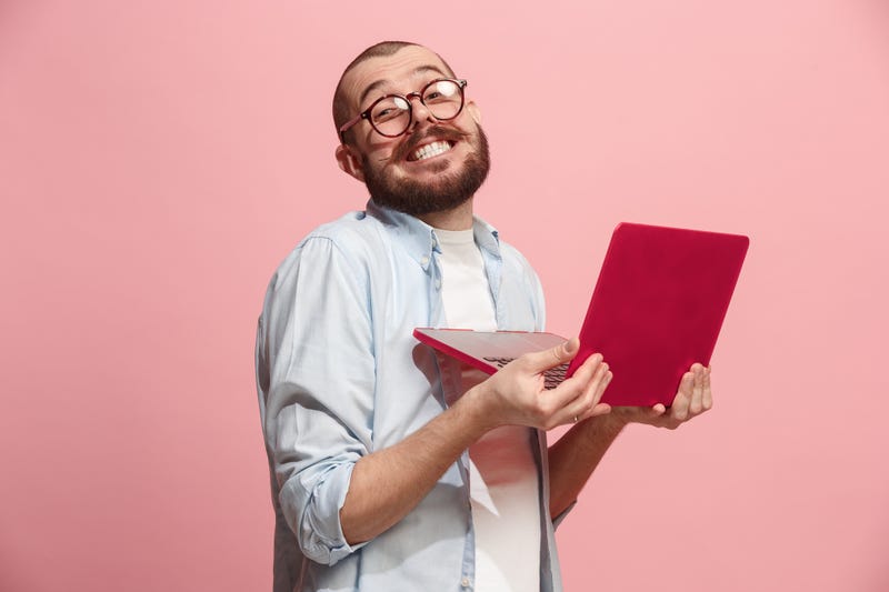 Man Smiling With Computer