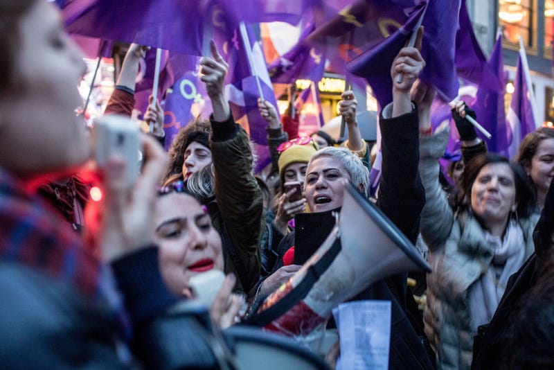 People chant slogans as they march down Istanbul's famous Istiklal street during a rally for International Women's Day 2018 in Istanbul, Turkey.
