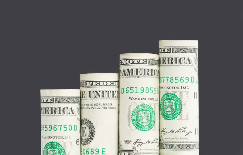 Dollars depicting a bar graph.