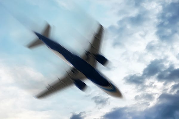 Plane in sky shaking during turbulence