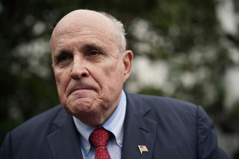 Rudy Giuliani, former New York City mayor and current lawyer for U.S. President Donald Trump, speaks to members of the media during a White House Sports and Fitness Day at the South Lawn of the White House May 30, 2018 in Washington, DC.