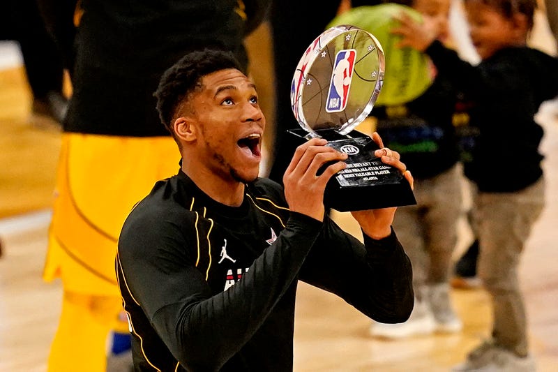 Mar 7, 2021; Atlanta, Georgia, USA; Team LeBron forward Giannis Antetokounmpo of the Milwaukee Bucks (34) reacts to being named the MVP of the 2021 NBA All-Star Game at State Farm Arena. Mandatory Credit: Dale Zanine-USA TODAY Sports