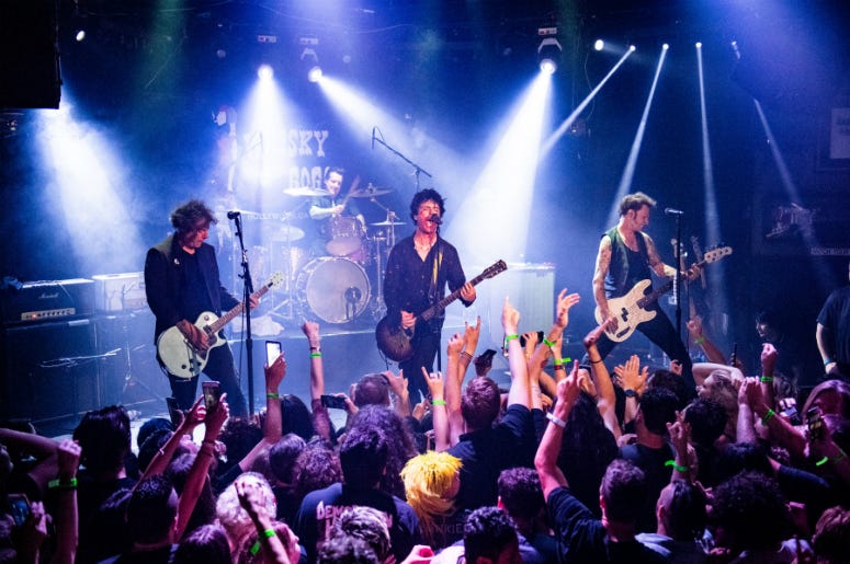 Green Day perform during the “Hella Mega Tour” announcement show at Whisky a Go Go