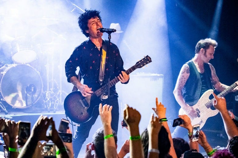 Billie Joe Armstrong and Mike Dirnt of Green Day perform