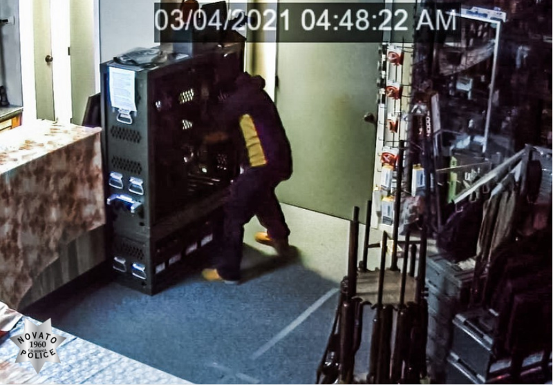 Novato Police said the suspect, who fled the scene on foot, left his green 1997 Honda Civic wedged inside the store.